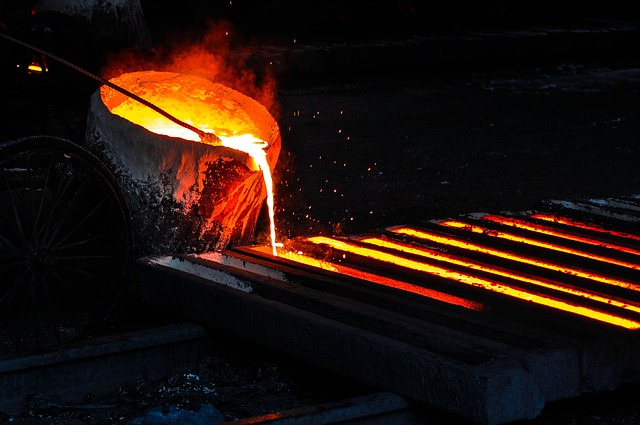 foundry crucible pouring metal into moulds for blog by Emelin on furnace insulation basics